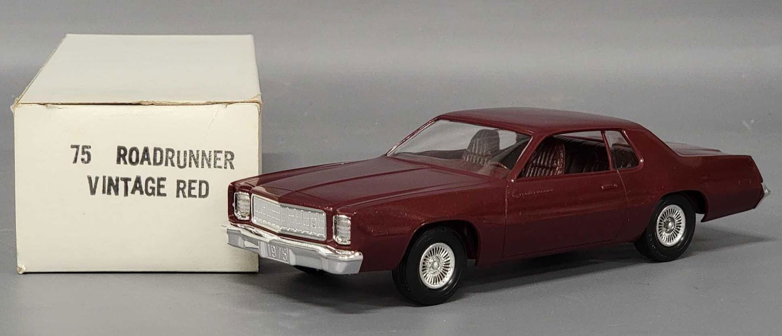 1975 vintage red Plymouth Roadrunner dealer promo car (1 of 7)
