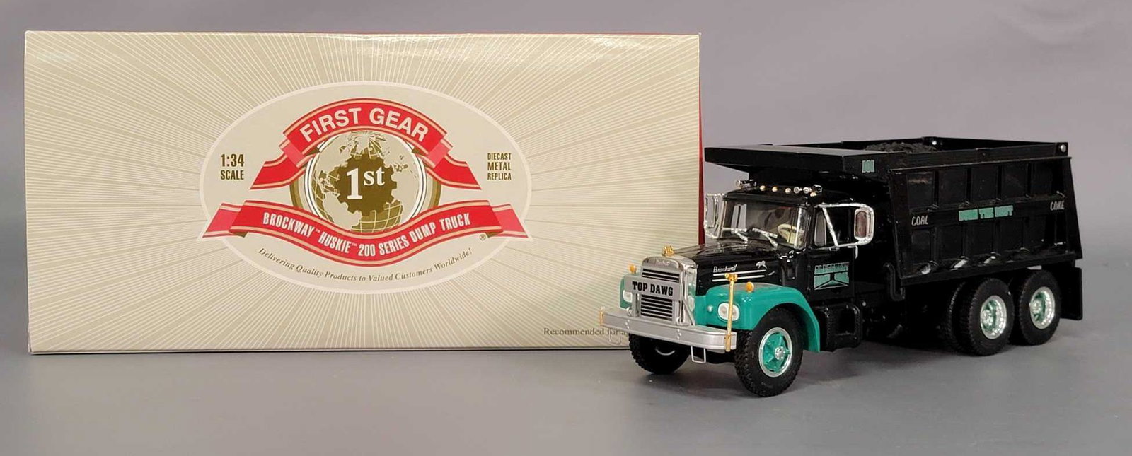 1st Gear No.19-3359 Brockway Huskie 200 Series dump: 1st Gear No.19-3359 Brockway Huskie 200 Series dump truck in original box. Allegheny 1:34 scale die cast vehicle has been displayed. Passenger side clearance marker is broken off. Box shows no wear. S