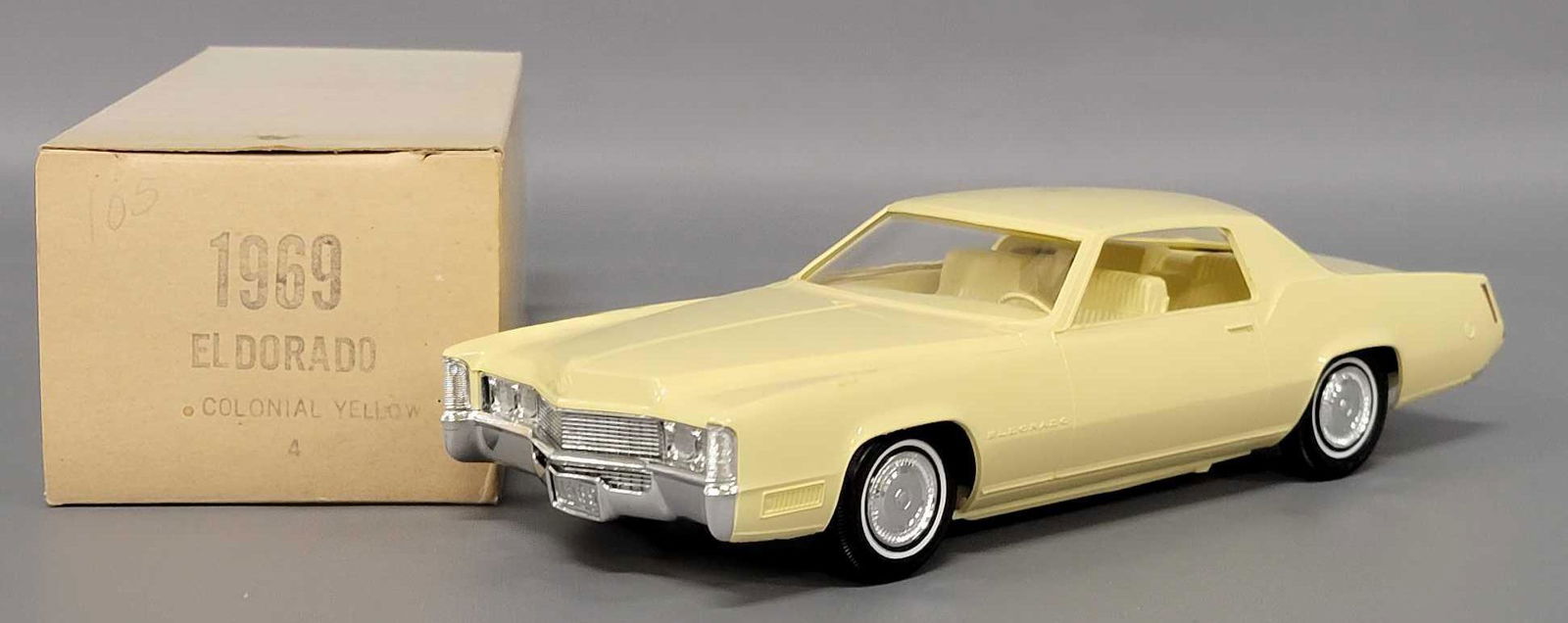 1969 Cadillac Eldorado in Colonial Yellow with original: 1969 Cadillac Eldorado in Colonial Yellow with original box. Car is in excellent condition with a very light scratch on the windshield and trunk. Box is excellent with normal shelf wear.