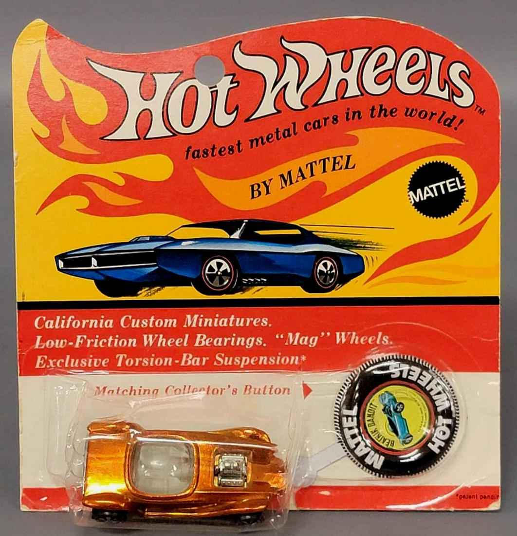 Hot Wheels Redline US Orange Beatnik Bandit on Blister: Hot Wheels Redline US Orange Beatnik Bandit on Blister Card. Car is mint with no toning and a white interior, the card is good with edgewear in spots, the blister is clear but has been crushed at some