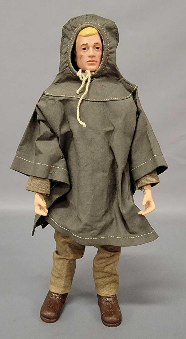 Vintage Hasbro GI Joe Action Soldier w/Command Post: Vintage Hasbro GI Joe Action Soldier with Command Post Communications accessories. Light wear to hair. Crack at knees. Torso is marked R Patent Pending. Poncho has little lining left, white stitches. 