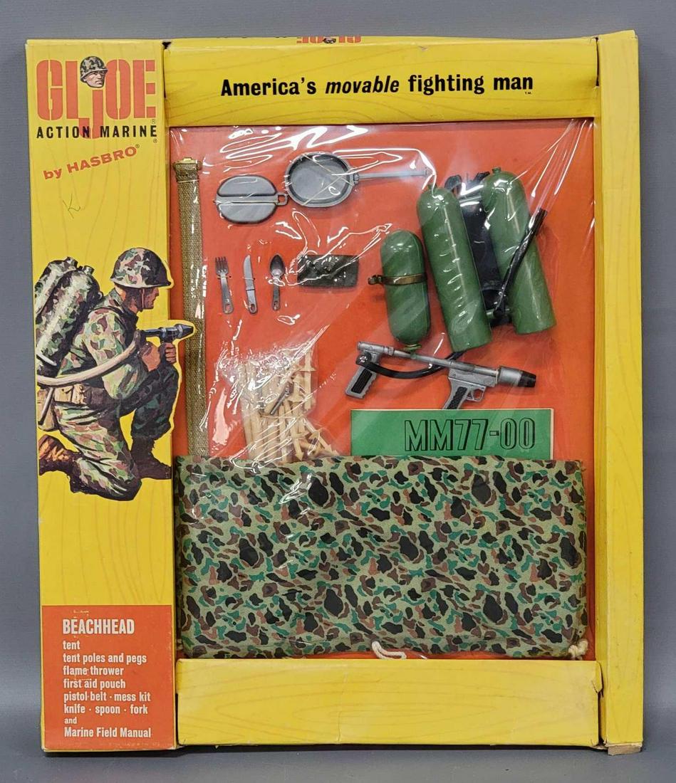 Vintage Hasbro Action Marine GI Joe Beachhead on window: Vintage Hasbor Action Marine GI Joe Beachhead equipment on window box, 7711. Box has tears at bottom corners of window. Box is marked The British Crown Colony of Hong Kong.