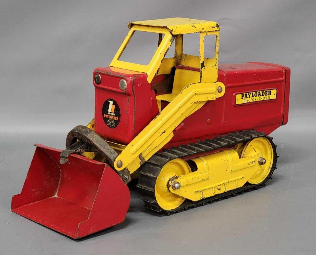 Nylint Hough Payloader Tractor-Shovel: Nylint Hough Payloader Tractor-Shovel. Tractor has paint loss and scratches throughout and is missing the smoke stack and the cab control levers. The scooper raises and lowers as it should.