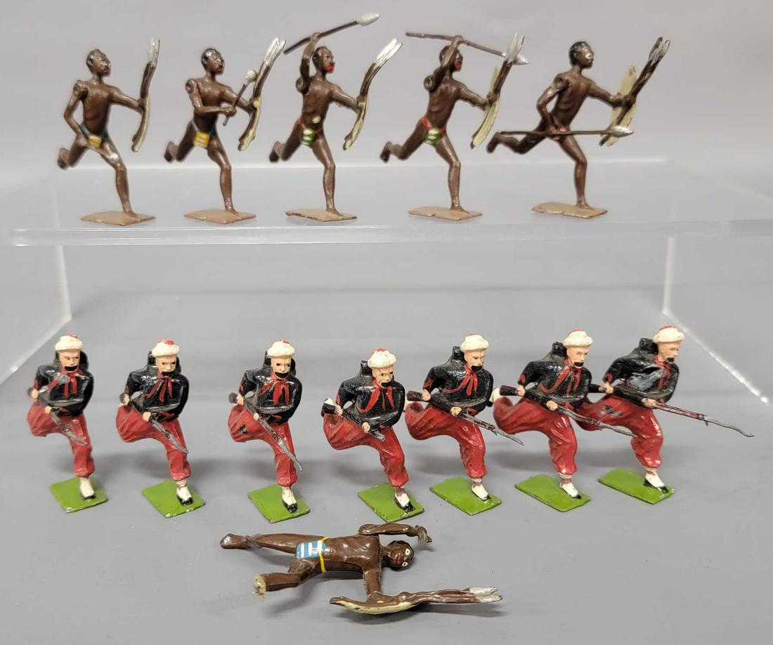 Britains lead soldiers 7 Zouaves and 6 Zulus: Britains lead soldiers, seven Zouaves and six Zulus. One Zulu is missing base, one Zouave is missing bayonet. Very light paint loss/chipping. Nice group of clean figues with bright and strong paint.