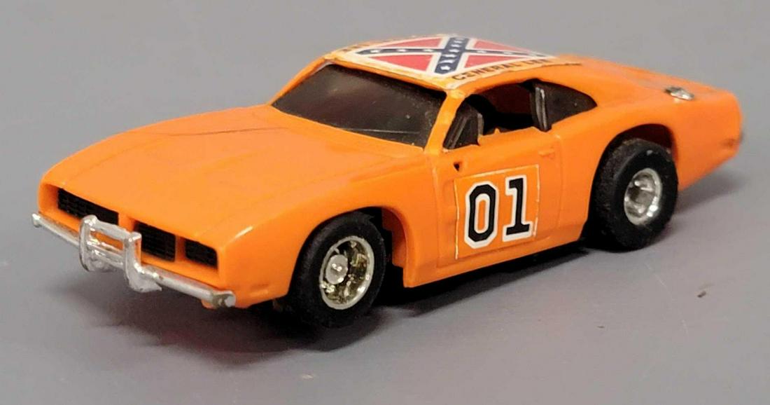 Ideal Dukes of Hazzard HO slot car runs: Ideal Dukes of Hazzard HO slot car, runs. Please view all the photos as these are sold as they are shown in our photos with no returns.