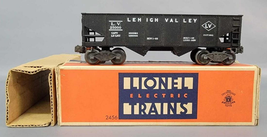 Postwar Lionel O gauge 2456 hopper car in original box: Postwar Lionel O gauge 2456 hopper car in original box with insert with neat mottled pickup shoe, C8. Box has repaired flaps and reglued seam, otherwise still looks nice with a solid insert.