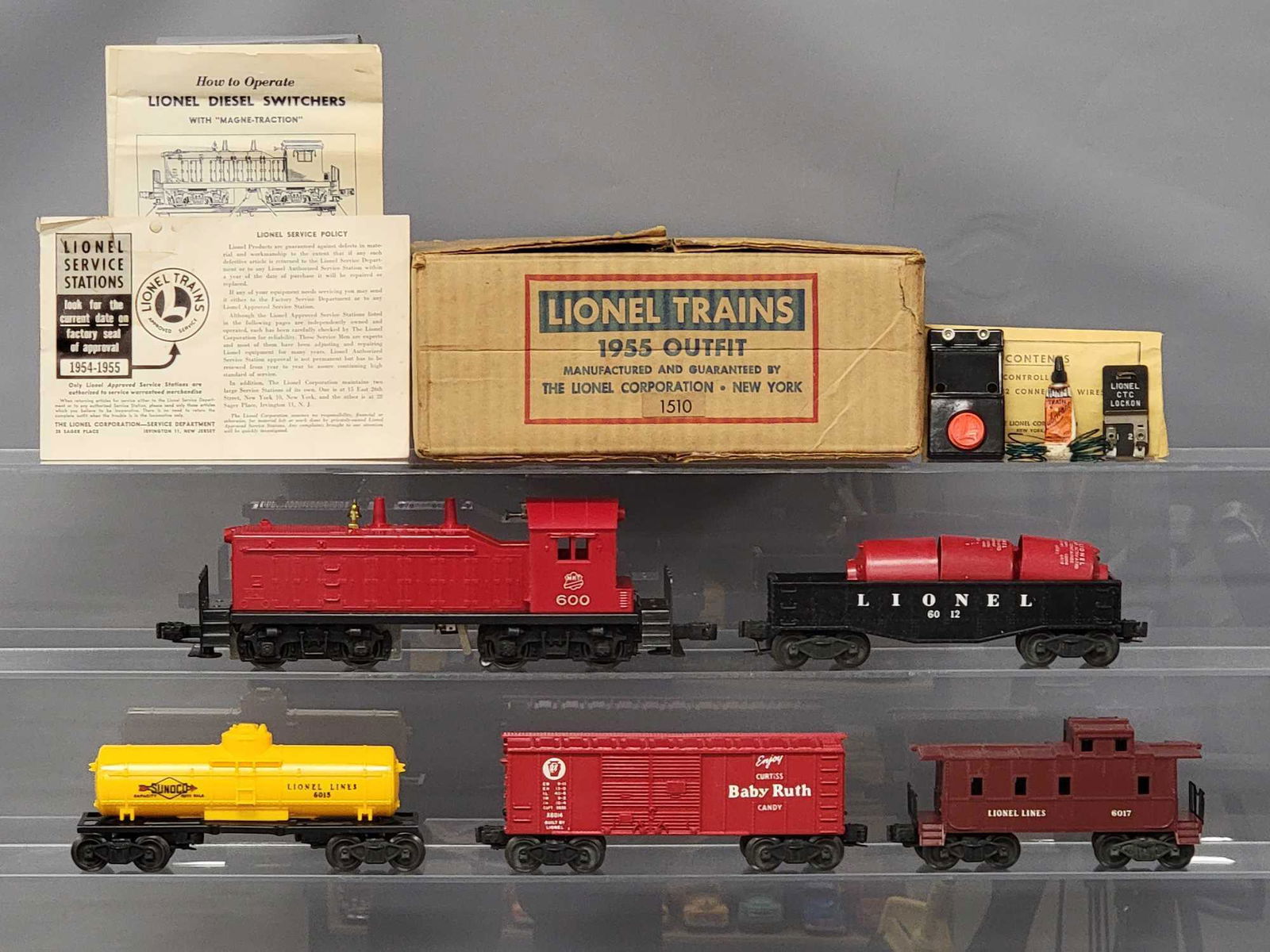 Boxed Lionel postwar O 1510 1955 uncatalogued switcher: Boxed Lionel postwar O 1510 1955 uncatalogued switcher freight set, to include 600 MKT Switcher diesel 6015 single dome tanker, x6014 Baby Ruth box car and 6017 Lionel Lines caboose, trains are very c