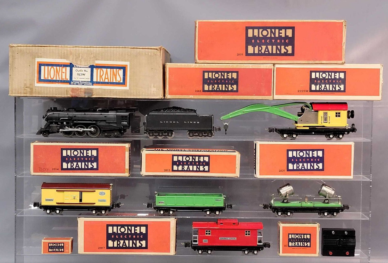 Prewar Lionel O gauge 193W 226E and 2226W steam whistle: Prewar Lionel O gauge 193W freight outfit consisting of: 226-E 2-6-4 steam locomotive and 2226W twelve wheel whistle tender with 2812 gondola, 2814 box car, 2810 derrick car , 2820 floodlight car, and