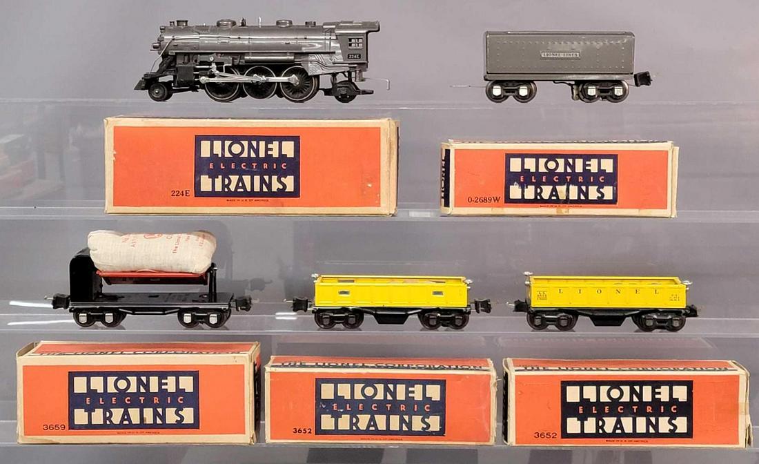 Prewar Lionel O guage 224E O-2689W freight out fit with: Prewar Lionel O gauge freight outfit with 224E 2-6-2 steam locomotive and 0-2689W whistle tender in gun metal gray with two 3652 remote control gondola cars with original barrels, 3659 remote control