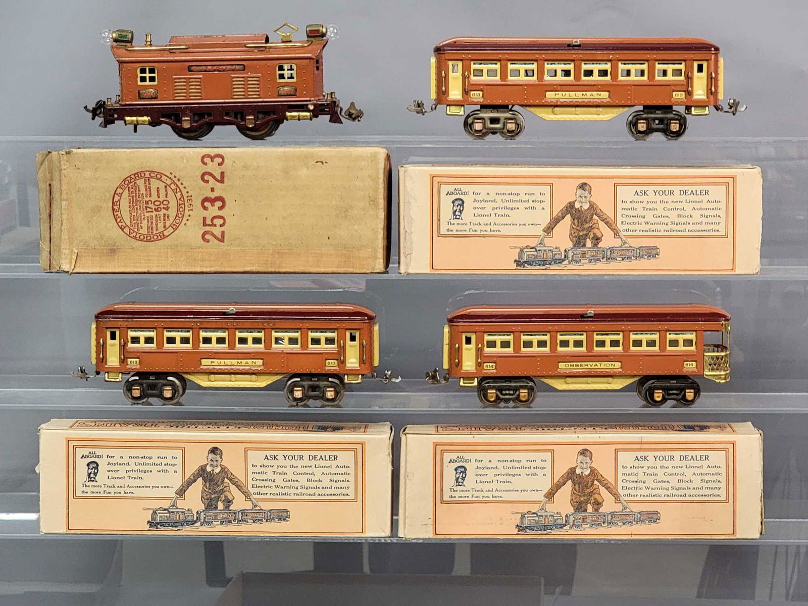 Prewar Lionel O guage 253E boxcab electric 613 613 and: Prewar Lionel O gauge 253E boxcab electric locomotive with two 613 Pulllman coaches, and 614 Observation passenger cars. Cars look a little better than loco, but still super nice C6. Trains are clean