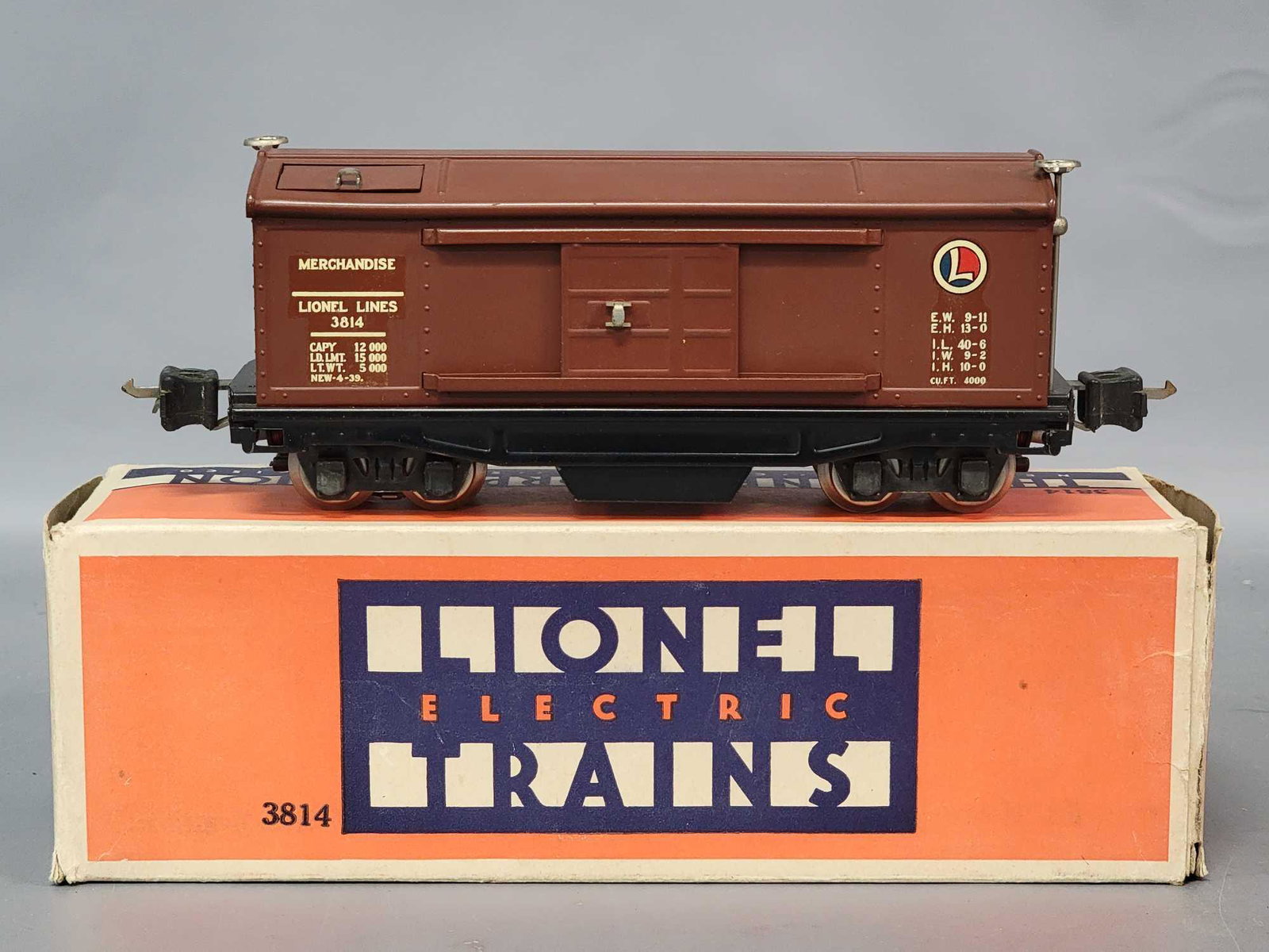 Prewar Lionel O gauge 3814 remote control merchandise: Prewar Lionel O gauge 3814 remote control merchandise car in original box, C8. Box has two very small punctures (think two track pins) and some light wear, square and strong.