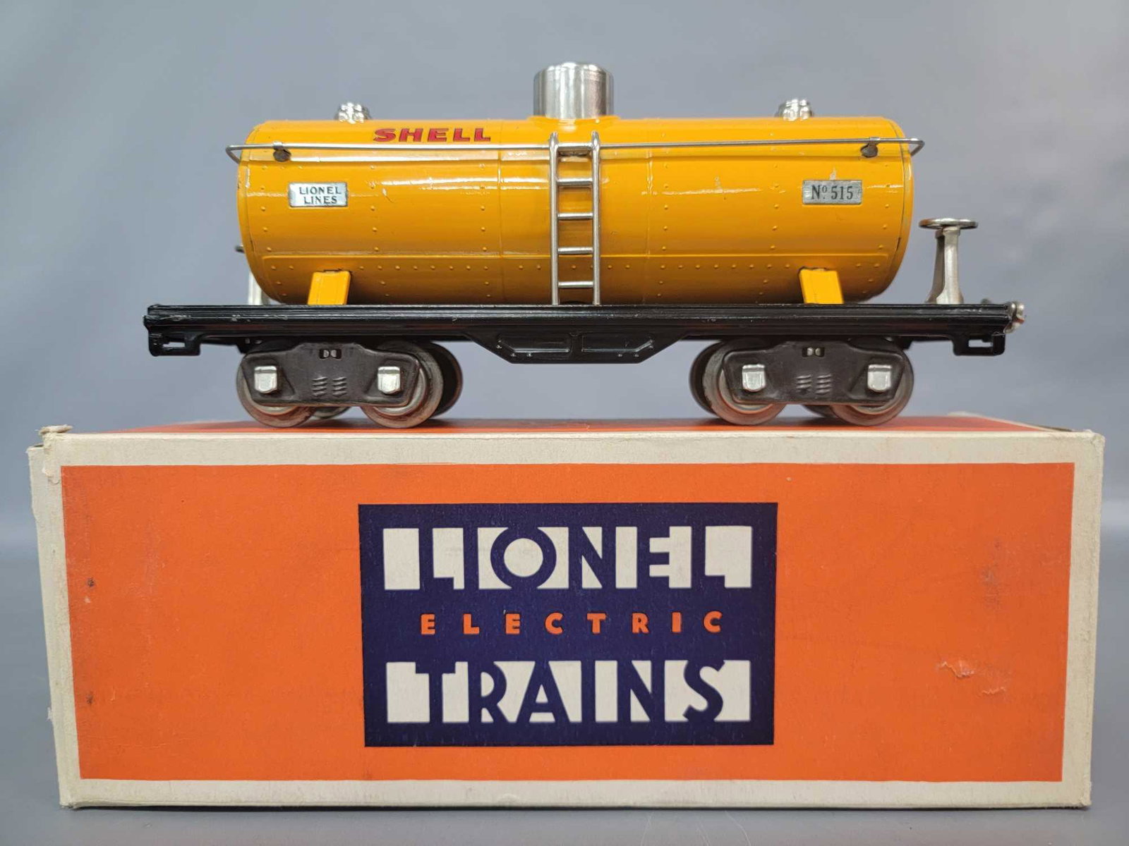 Prewar Lionel Standard Gauge 515 Shell tank car in: Prewar Lionel Standard Gauge 515 Shell tank car in original box, super nice clean and shiny C6. Box has a little very light wear, very clean and bright.