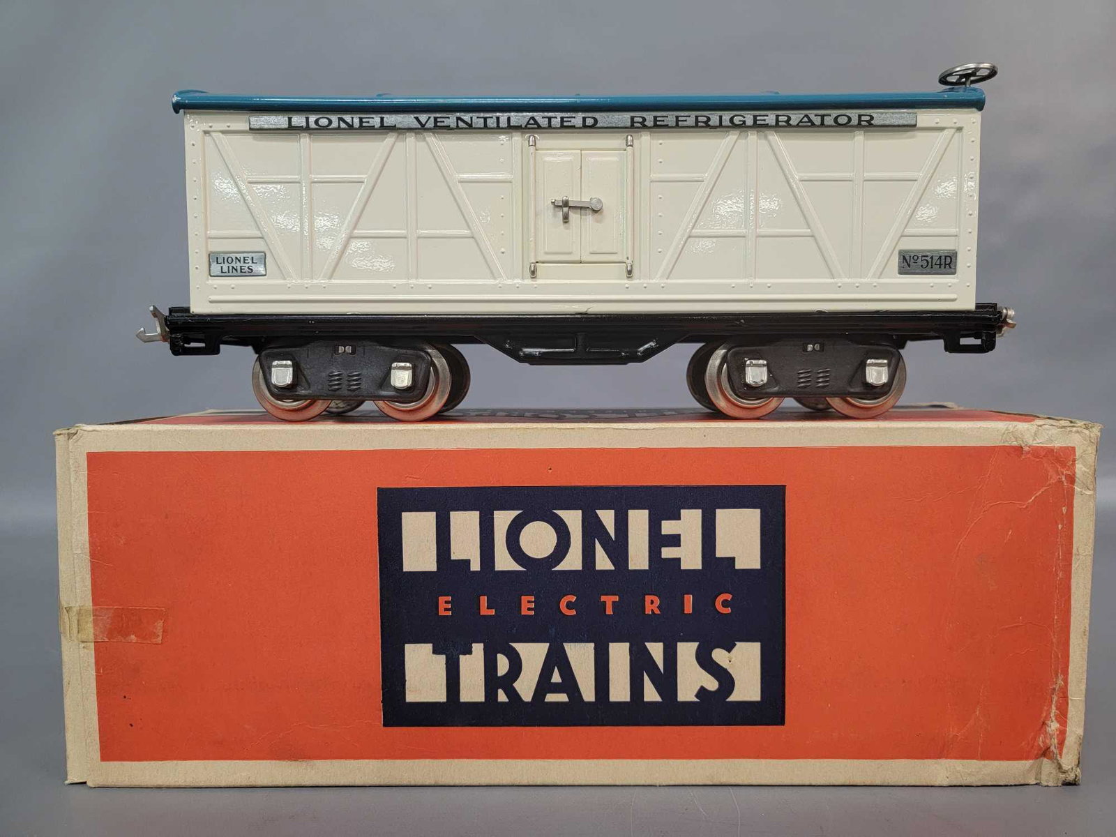 Prewar Lionel Standard Gauge 514R refrigerator car: Prewar Lionel Standard Gauge 514R refrigerator car Cream in original box, C9. Box shows some wear and tear to one end, otherwise clean, bright, square, and solid.
