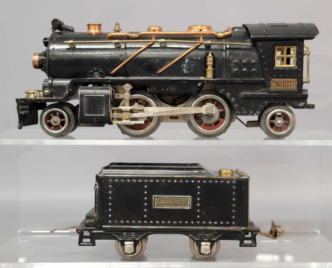 Prewar Lionel O gauge 261 2-4-2 steam locomotive and: Prewar Lionel O gauge 261 2-4-2 steam locomotive and 257T tender with orange stripe, loco is Not a 261E. Trains look really nice C6.