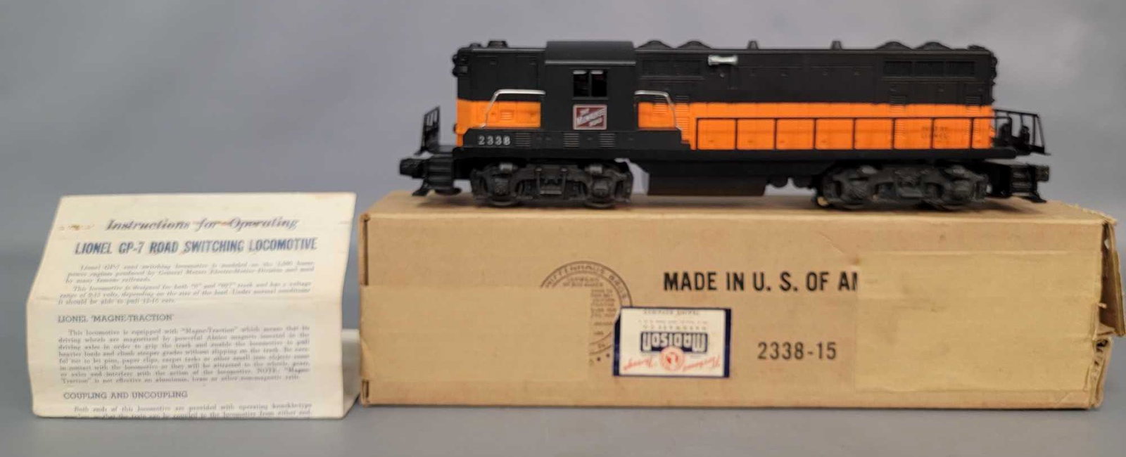 Postwar Lionel O gauge 2338 The Milwaukee Road GP-7: Lionel 2338 The Milwaukee Road GP-7 diesel locomotive in original box with instructions sheet, C7+. An incredible looking train. Box is near perfect with a Madison Hardware label.
