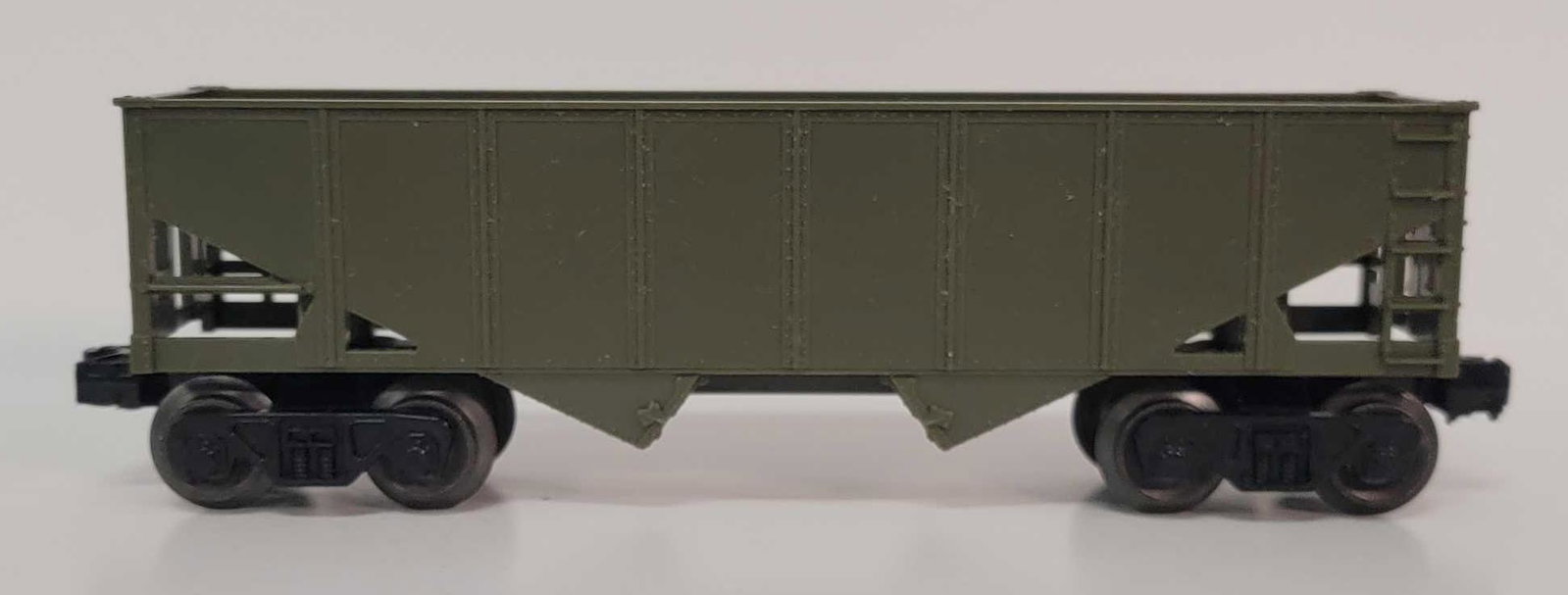 Postwar Lionel O gauge 6176-100 olive drab hopper: Postwar Lionel O gauge 6176-100 olive drab hopper, C7.