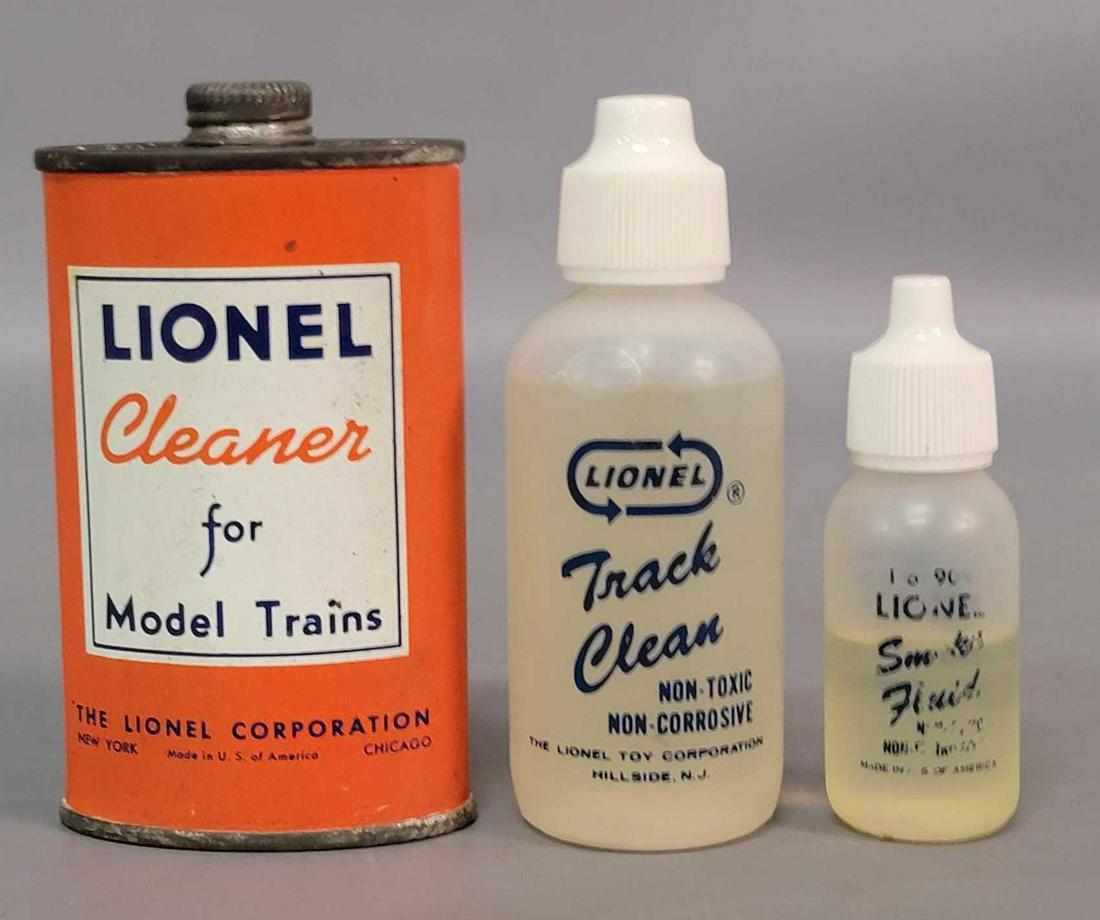 Postwar Lionel O gauge track cleaner tin track cleaner: Postwar Lionel track cleaner fluid tin, track cleaner in plastic bottle, and smoke fluid in plastic bottle.