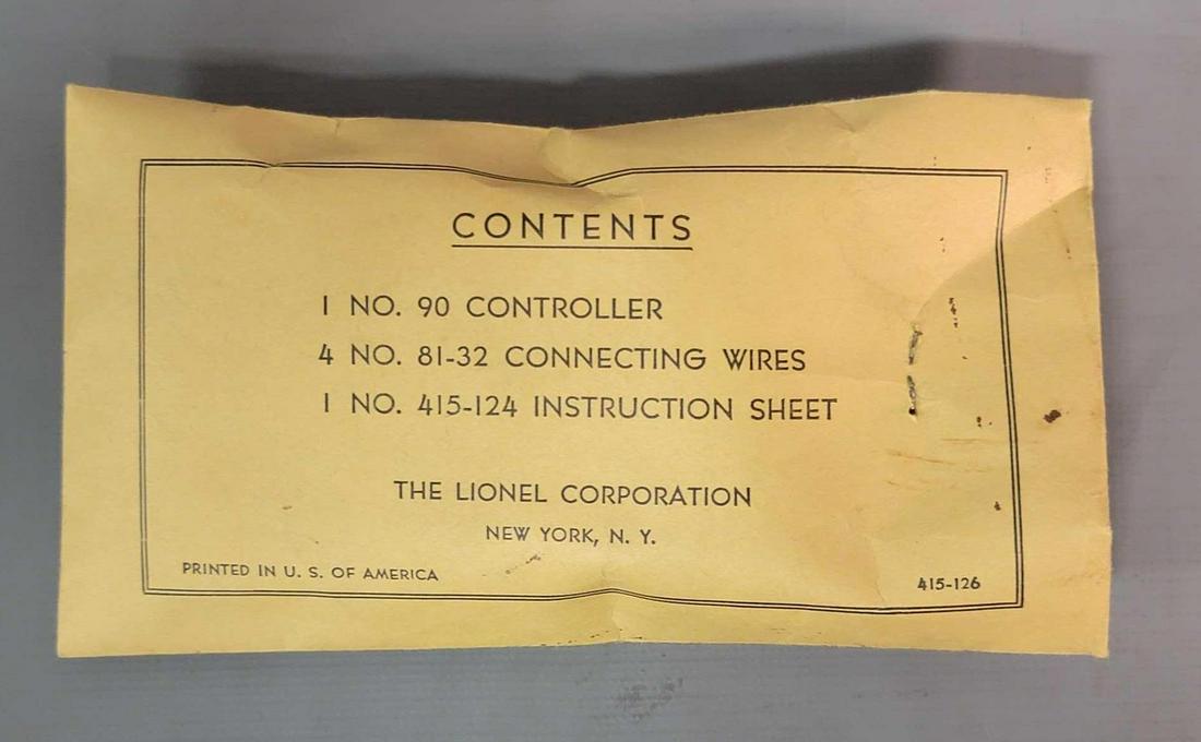 Postwar Lionel O gauge 415-126 components envelope: Postwar Lionel O gauge 415-126 components envelope stapled shut. Components envelope for diesel fueling station.