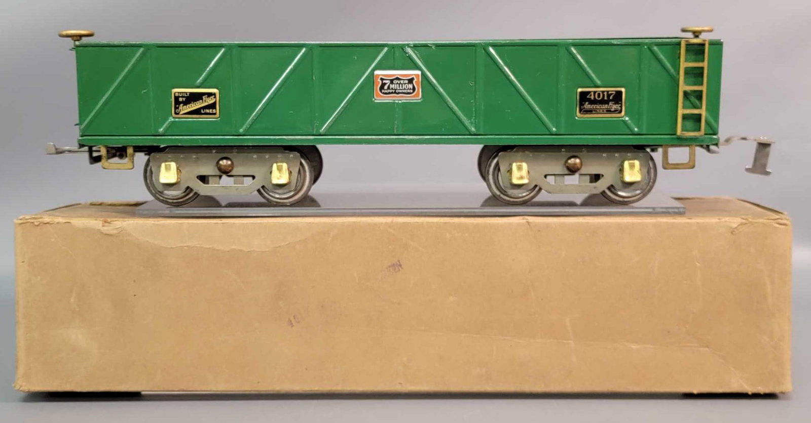 Prewar American Flyer Wide Gauge 4017 sand car in: Prewar American Flyer Wide Gauge 4017 sandcar in green, aluminum Over 7 Million Happy Owners plates, brass trim, gray painted frames, High Speed Trucks paper labels. Train is very clean and shiny stro