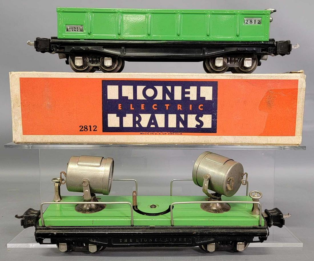 Lionel prewar O gauge 2812 green gondola in original: Lionel prewar O gauge 2812 green gondola in original box plus 2820 floodlight car, C6-, both cars have all nickel trim and journals, the original box is good with some outer tape repairs.
