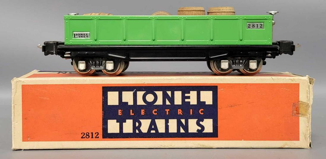 Lionel prewar O gauge 2812 green gondola in original: Lionel prewar O gauge 2812 green gondola in original box, C8 car with four two-piece barrels and a good original box with missing inner flaps.