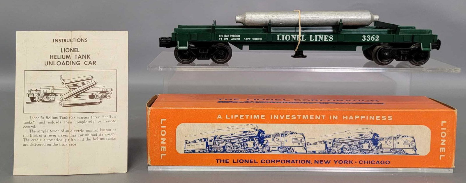 Lionel postwar O 3362 helium tank unloading car: Lionel postwar O 3362 helium tank unloading car, shows light run time and is C8 in an excellent original box with a crisp original instruction sheet.
