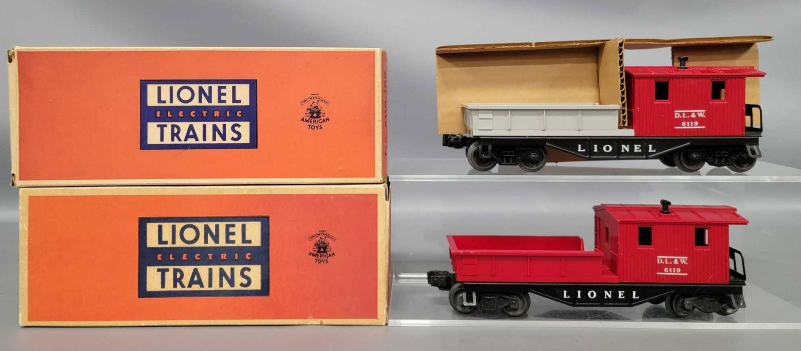 Two Lionel postwar O 6119-100 D.L. & W. work cabooses (1 of 8)