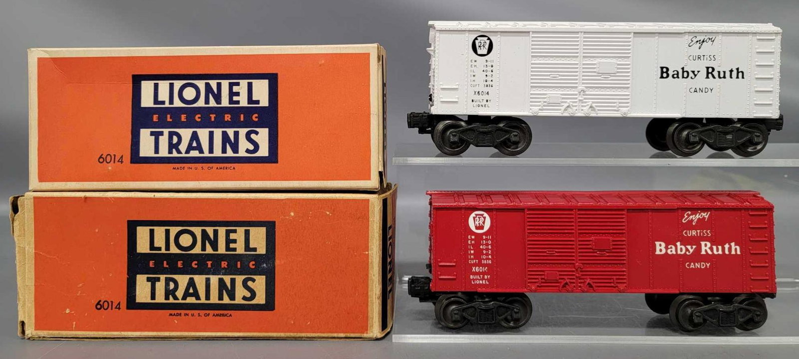 Two Lionel postwar O 6014 Baby Ruth box cars in: Two Lionel postwar O 6014 Baby Ruth box cars in original boxes. Both cars show light run time and are C8-9 in one fair and one good original boxes.