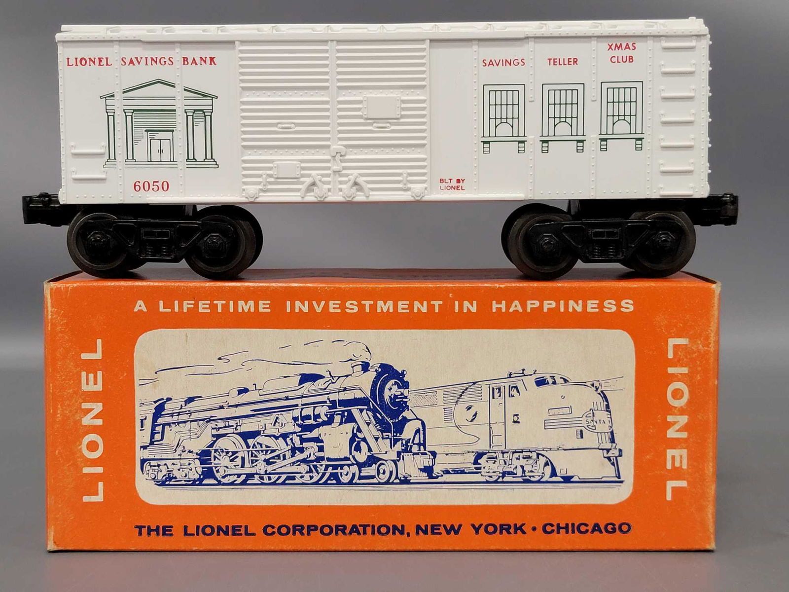 Unrun Lionel postwar O 6050 savings bank box car in (1 of 6)