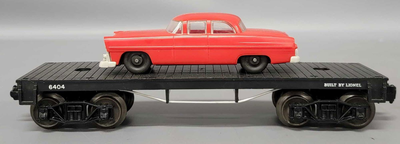 Lionel postwar O 6404 flat car with red auto (1 of 6)