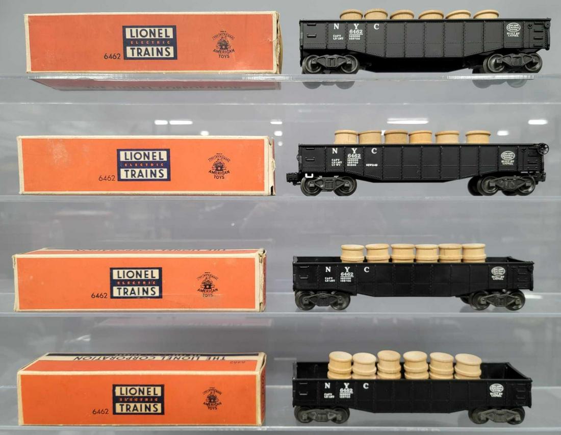 Four different Lionel postwar O black 6462 New York: Four different Lionel postwar O black 6462 New York Central hoppers in original boxes. All four show moderate run time and are C7-8 in fair to good original boxes with six barrels each.