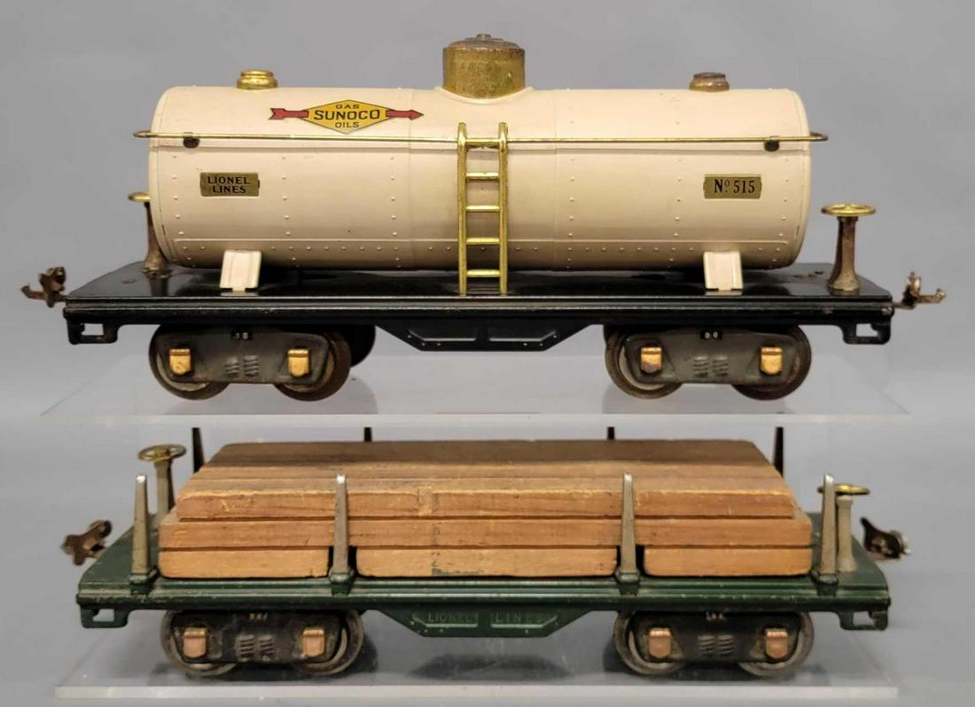 Lionel standard gauge 511 515 freight cars: Lionel standard gauge green 511 lumber car with original load and 515 tank car, C5-6.