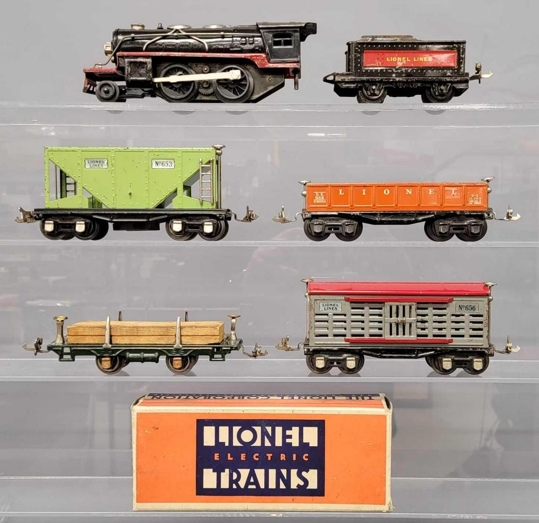 Grouping of Lionel prewar O gauge trains: Grouping of Lionel prewar O gauge trains to include 1681 Lionel Junior steam locomotive and tender, 653 hopper, 652 gondola, 656 stock car and 831 lumber car, C5-6.