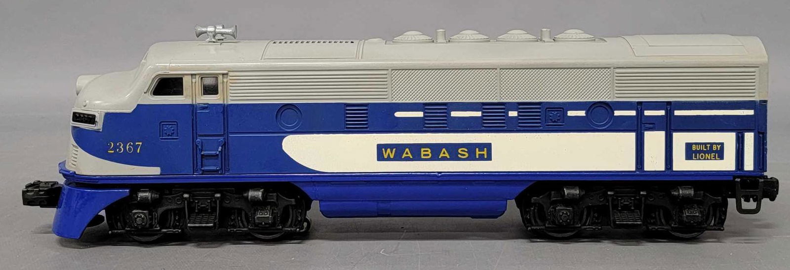 Custom Lionel postwar O 2367 Wabash F3 A diesel: Custom Lionel postwar O 2367 Wabash F-3 A diesel locomotive. Original shell on a custom painted frame so that it could be poart of an ABA set since Lionel only produced an AB set. The shell is C7, the