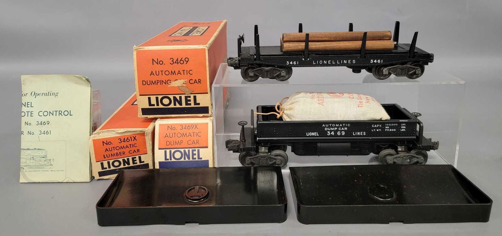 Lionel postwar O 3469 dump car 3461 log car in OBs (1 of 12)