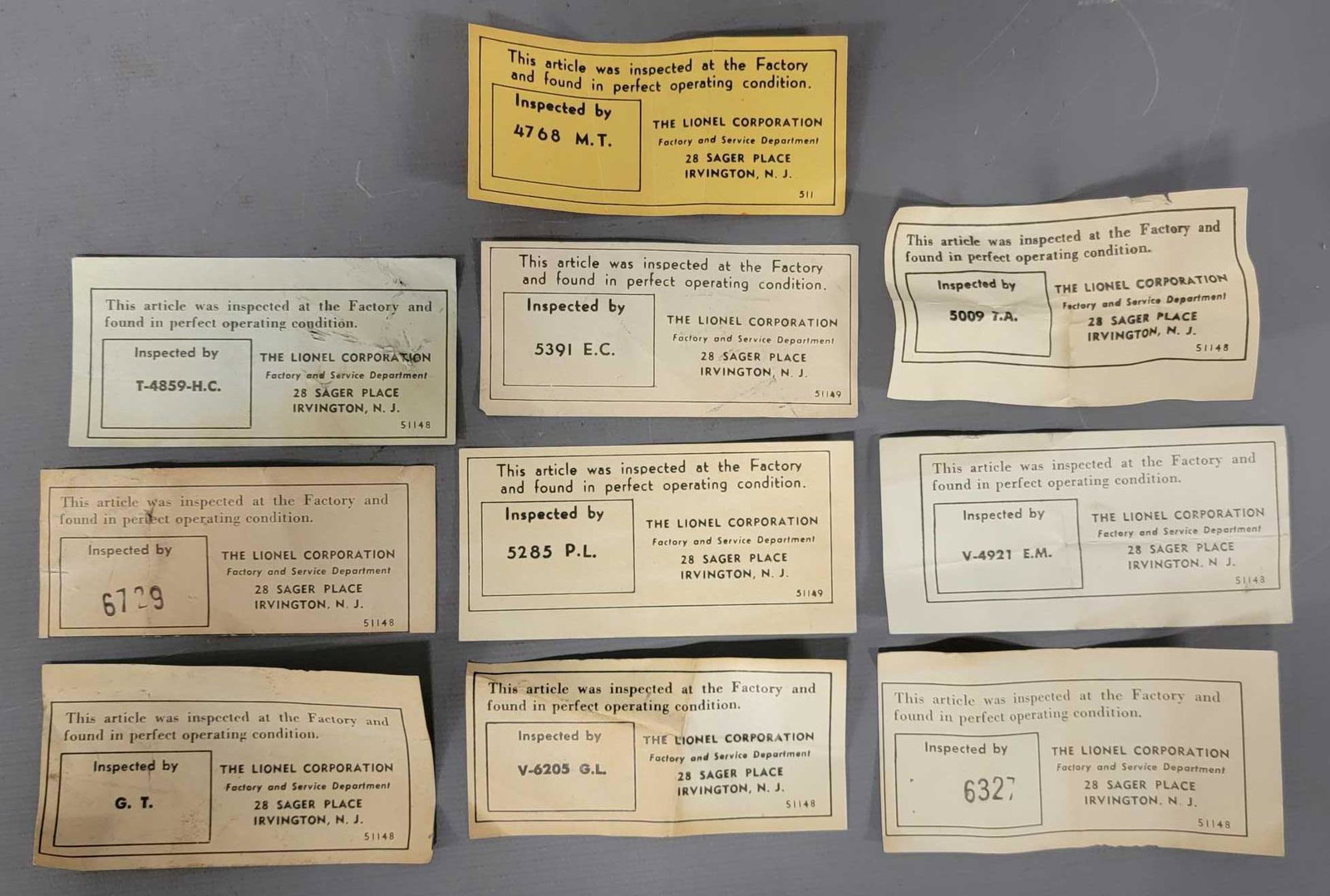 Group of ten Lionel postwar inspection tags: Group of ten Lionel postwar inspection tags. All are in good to excellent condition with no tears or rips.