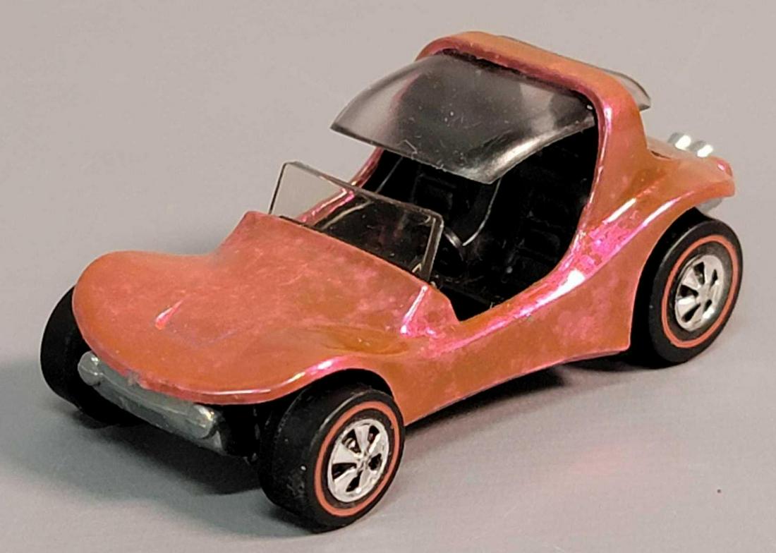 Hot Wheels Redline toned hot pink Sand Crab: Hot Wheels Redline toned hot pink Sand Crab. This car has severe toning, it may have been clear coated at some point? It is excellent with a chip at the front lip but otherwise extremely nice.