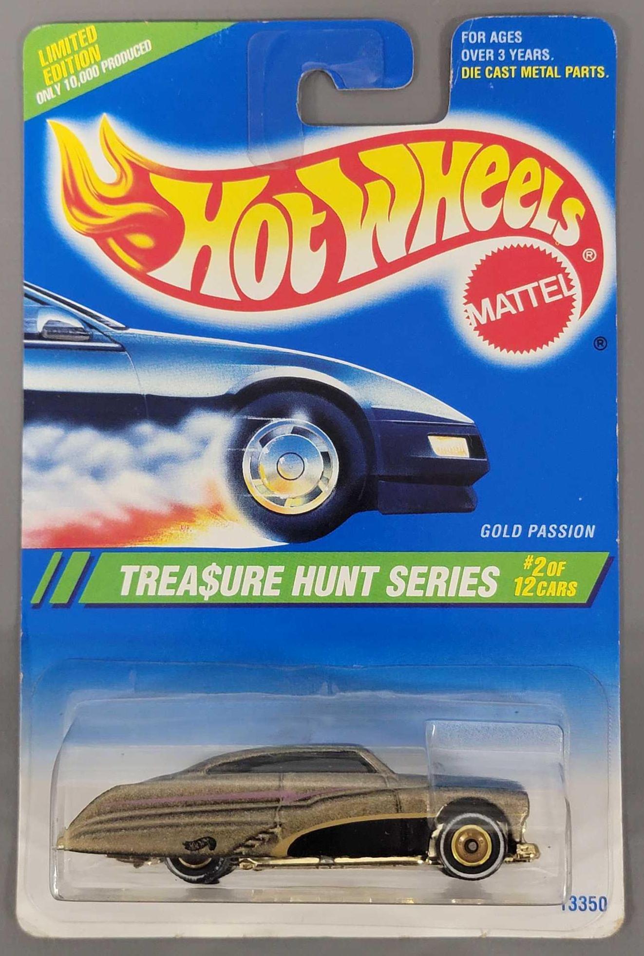 1995 Treasure Hunt Gold Passion: 1995 Treasure Hunt Gold Passion. Car is mint on an excellent card with no issues and a nice clear blister. Straight out of a JC Penney catalog set.