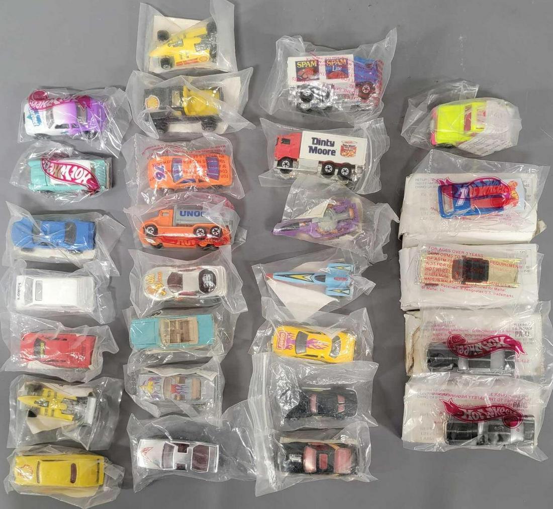 Group of twenty seven Hot Wheels Baggie and Mailaway: Group of twenty seven Hot Wheels Baggie and Mailaway cars. Group includes twenty seven different cars from shell, getty and some straight from Mattel. Most are in sealed original baggies, a few are in