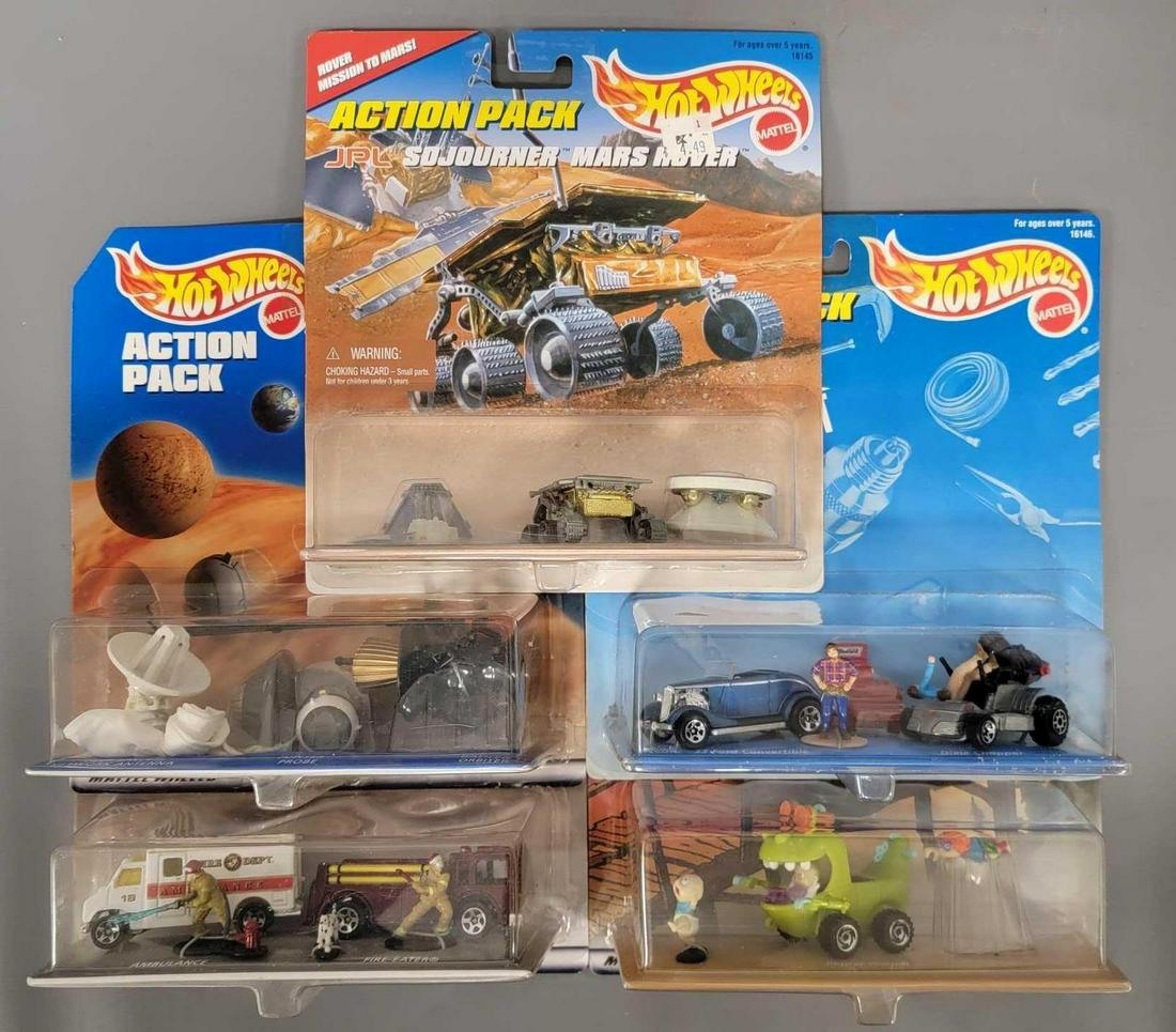 Group of five Hot Wheels Action Pack sets: Group of five Hot Wheels Action Pack sets. Group includes Home Improvement, Sojourner Mars Rover, Rug Rats, Galileo Mission and Fire 'N Rescue. All are excellent on very good cards, but a few have