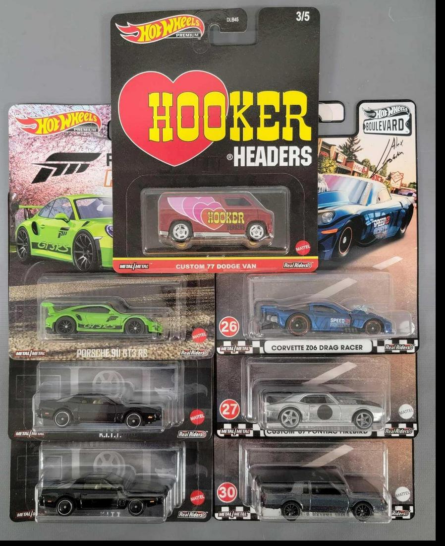 Group of seven Hot Wheels Premium carded cars: Group of seven Hot Wheels Premium carded cars. Group includes two Real Riders Knight Rider K.I.T.T. Cars, a green Forza Horizon 4, Hooker Headers custom 77 Dodge Van, three different Hot Wheels Boulev