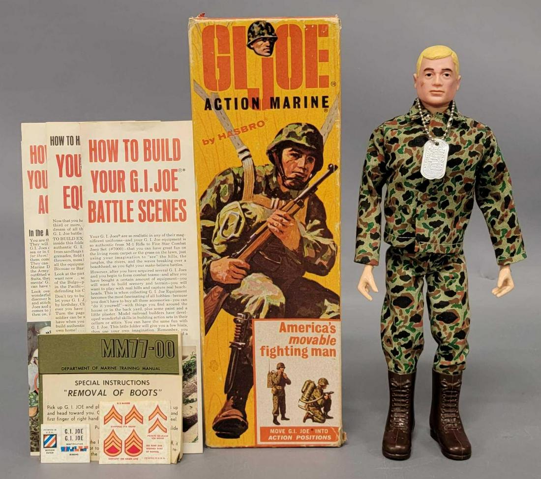 Vintage Hasbro 7700 GI Joe Action Marine in double R box: Vintage Hasbro 7700 GI Joe Action Marine in double R box, Joe head is blonde hair and near mint, Pat pending on rear, body is clean with only one split in right thigh at hip joint, uniform is Hasbro J