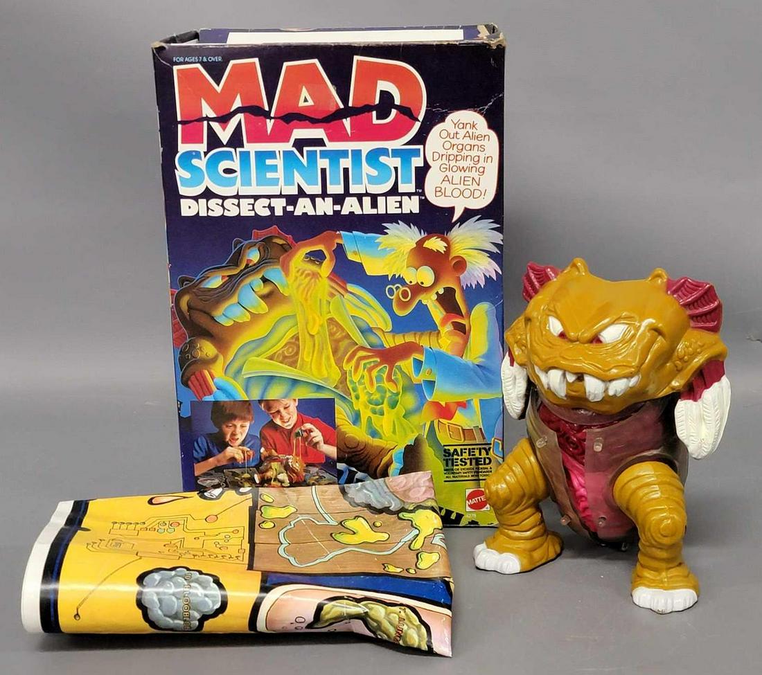 1986 Mattel Mad Scientist dissect an alien: 1986 Mattel Mad Scientist dissect an alien in original box. Has all 12 body organs but is missing the scalpel, the slime is all gone and the body bag is gone. The original box is missing two thirds of