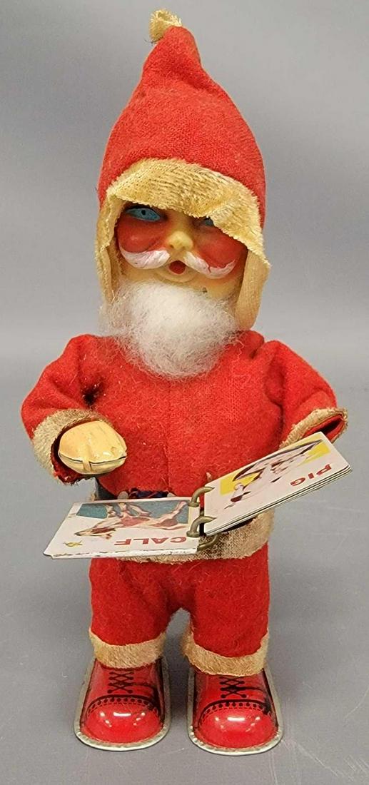 Alps Japan tin lithograph windup reading santa (1 of 7)
