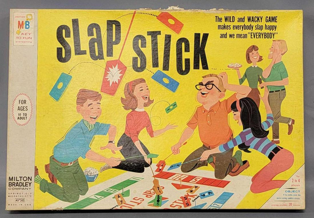 Milton Bradley Slap Stick board game inner contents sealed: Milton Bradley Slap Stick board game inner contents sealed, inner contents are factory shrink wrapped except the slap sticks themselves, they look to have never been out. Box is solid but does have so