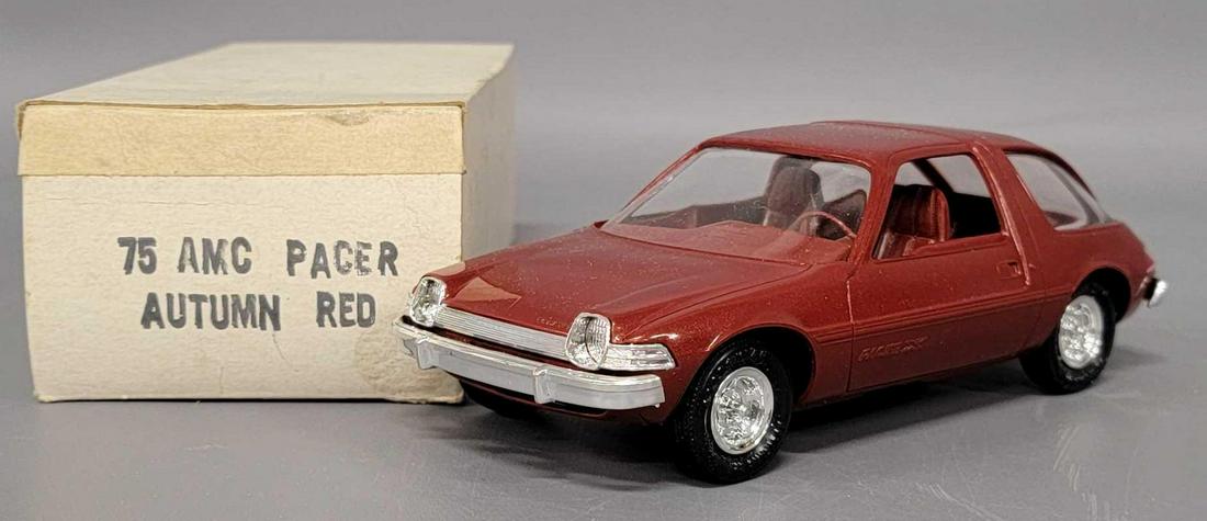 1975 Autumn red AMC Pacer dealer promo coaster car in original box: 1975 AMC Pacer dealer promo coaster car in Autumn red in original box, car is near mint to mint, original box is good but has tape repaired tuck flaps.