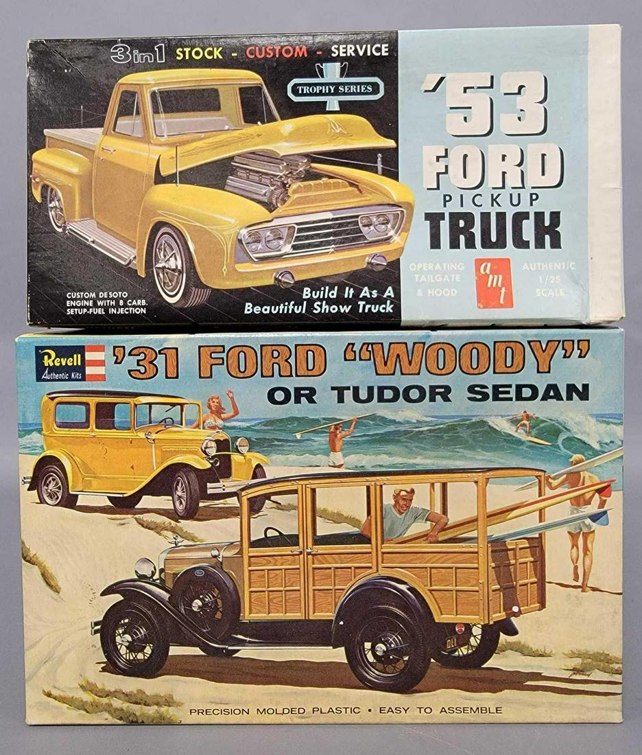 Two 1/25 scale model kits unbuilt in original boxes: Two 1/25 scale model kits unbuilt in original boxes, includes AMT 2153-149 '53 Ford pickup truck, kit is very good with excellent instruction and decal sheets, box is very good but has deep cuppin