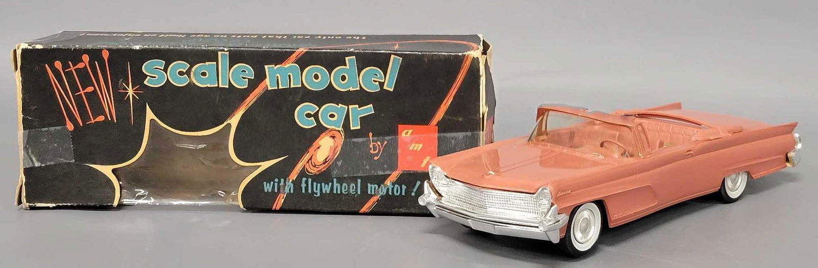 1959 rose Lincoln Continental convertible dealer promo friction car in original box: 1959 rose Lincoln Continental convertible dealer promo friction car, car is excellent but is missing the hood ornament, friction mechanism works great, original box is near complete as it is missing o