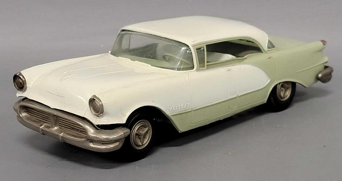 Jo-Han 1956 two tone Oldsmobile Holiday hardtop dealer promo friction car (1 of 7)