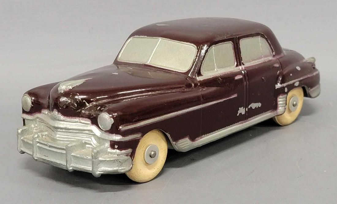 1949 maroon Chrysler dealer promo coaster car banthrico metal bank: 1949 maroon Chrysler dealer promo coaster car banthrico metal bank, car is good but has touchups and other body chips, base is solid, key hole is bent a bit, no key.